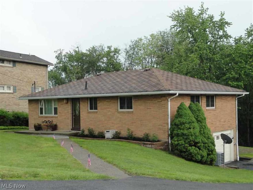 Lots of bells and whistles- New kitchen with all stainless steel appliances- ceramic floor & backsplash - hardwood floors throughout- new bath with Jacuzzi tub, heated floors & double sinks- new furnace & air- new windows- doors- driveway- blown in insulation- all brick ranch- easy one level- very clean & ready to see at your convenience.