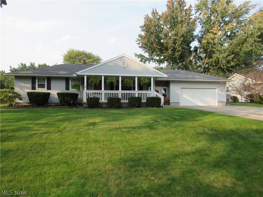 Pride of ownership throughout this gorgeous Ranch home, with over $30,000 in recent improvements including new roof, gutters , downspouts and new full bath with walk-in shower. Updated kitchen with new quartz counter tops ,replacement  windows & doors and much more. Don't miss this immaculate gem that is in absolute move in condition, freshly painted and tastefully decorated throughout. Enjoy your days & evenings from your beautiful covered front porch  or in your enclosed breezeway.Both porch and breezeway have new naturestone flooring. Private professionally landscaped fenced yard with a patio and storage barn.
