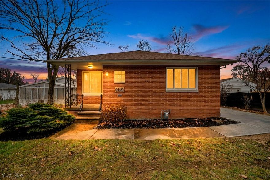 Welcome to this beautifully reimagined all-brick ranch, perfectly situated on a deep, wooded lot in the heart of Garfield Heights. From the moment you arrive, you’ll appreciate the timeless charm of the brick exterior paired with the modern updates that make this home truly move-in ready. Step inside to an inviting open layout filled with natural light and beautiful hardwood floors flowing through the living room, dining area, and all three bedrooms. The spacious living room opens to an adjoining dining area accented by an elegant chandelier. At the center of the home is the fully remodeled chef’s kitchen, with brand new cabinetry, granite countertops, a standout backsplash, and an oversized island that provides additional prep space and enhances the kitchen’s functionality. Brand-new stainless steel appliances—including a stove, refrigerator, microwave and dishwasher. The beautifully renovated bathroom offers a spa-like experience, showcasing a striking tiled feature wall, modern vanity, updated fixtures, and a stylish tub/shower combo. Downstairs, the expansive basement offers incredible versatility that provides additional living space and extra storage, with a dedicated laundry area featuring a brand-new washer and dryer. Mechanical updates include: a newer roof, brand-new furnace, hot water tank, and central air conditioning. Outside, the newer driveway leads to a detached 2-car garage, providing plenty of parking, while the oversized backyard offers privacy and a serene space, perfect for outdoor relaxation or entertaining. This home provides everything you need for comfortable, convenient, and enjoyable living. Don’t miss your chance to make this exceptional property yours— Hurry, This one won't last long! Schedule your private tour today!