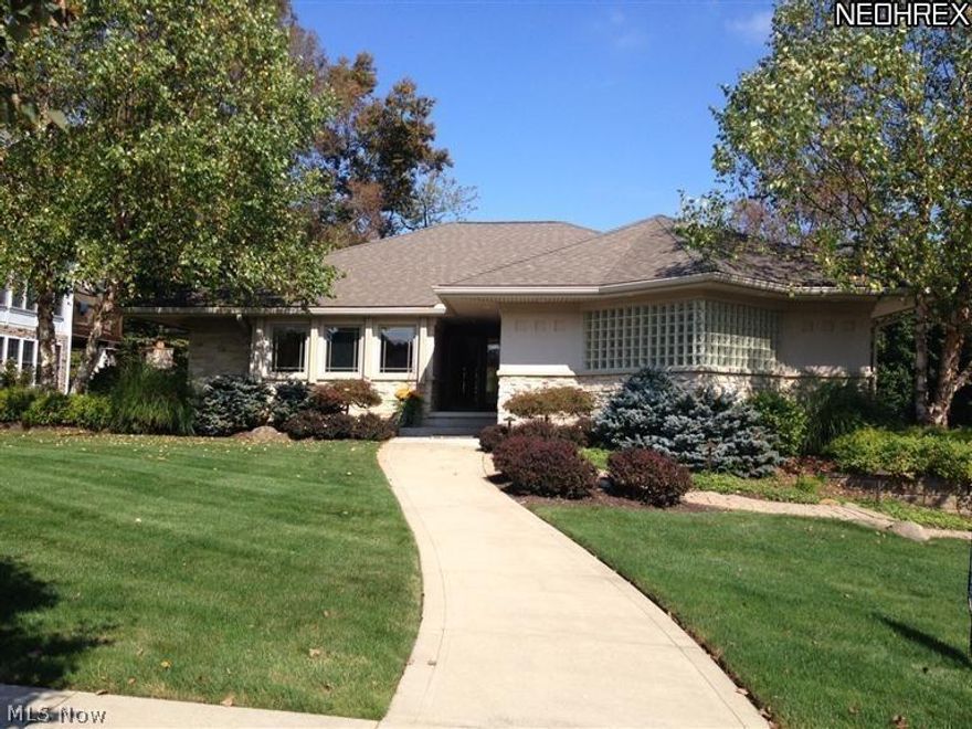 Astounding Frank Lloyd Wright Inspired Home on the 12th Fairway in Pambi Farm Estates...The Ultimate Design w/Authentic Style, Embellished with Today's Perfections! Step into this Stunning Masterpiece!  Gorgeous Hardwoods Throughout! Cherry Wood Flring, Elevated, Wood Enhanced, Tray Ceilings. Custom Molding, Wood Columns, Solid Birch Doors, Wood Beam Ceilings, 2 Fireplaces & More!  Inflections of Mission Style, Stone, Glass and Wood Artistry Thruout! State of the Art Kitchen! The 1st Flr Owner's Suite w/Whirlpool Bath, a Custom Tile Walk in Shower, Beautiful Tile/Stone Flring & of course, a Fantastic Walk in Closet! There is a Guest Ste on the First Floor as well, with a Lg Walk in Closet and Priv Bath! WAIT until You See the 1st Flr Laundry Retreat''! You may Never Leave...Beaut & Bright! Abundance of Painted Cabinetry, Lg Pantry, Beaut Corner Windows Allowing All the Nat Light.LL inclds Temp Controlled Wine Rm, FamRm, BR/BA, Too much to List. Call for more Details!