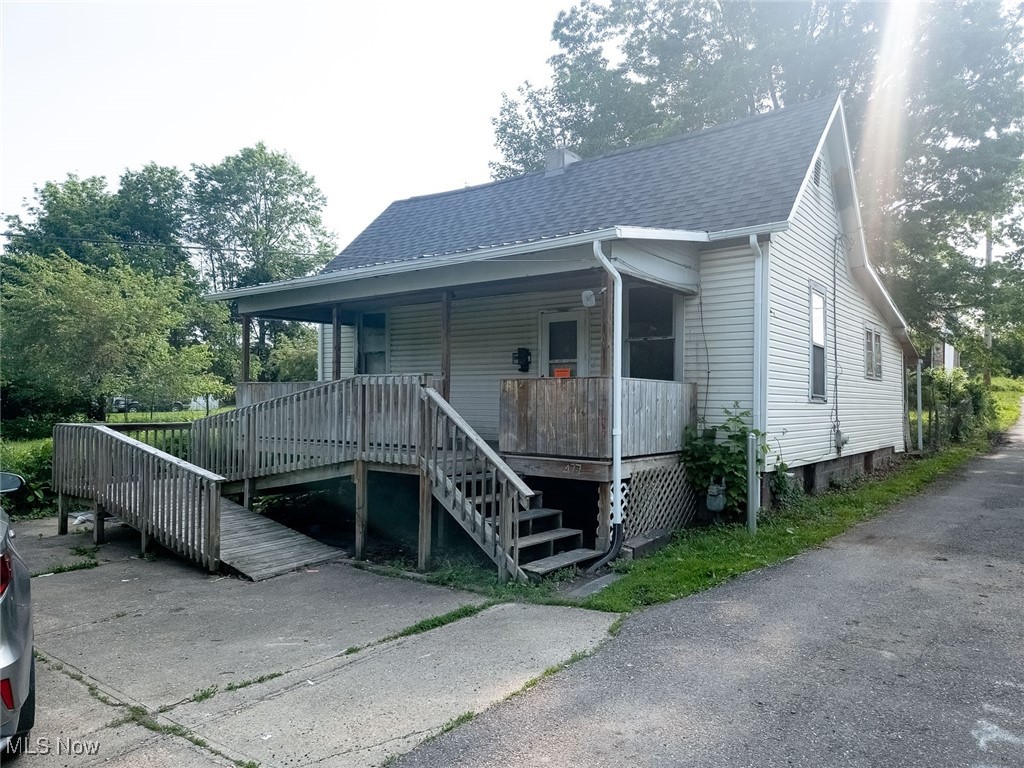Looking for a home with potential in a convenient Cambridge location? This single-story 1-bedroom, 1-bath property sits just off 5th Street and offers both a large front yard and shaded backyard—making it a great option for investors or first-time buyers looking to personalize a space. Recent updates include a new roof and basement steps in 2024, new kitchen base cabinets, and a reinforced metal center beam within the last year. A spacious concrete parking pad provides ample off-street parking, and the large covered front porch—with a ramp for easy access—adds charm and functionality. With a little vision and elbow grease, this home could be a smart investment or an affordable entry point into homeownership, all just minutes from downtown Cambridge.