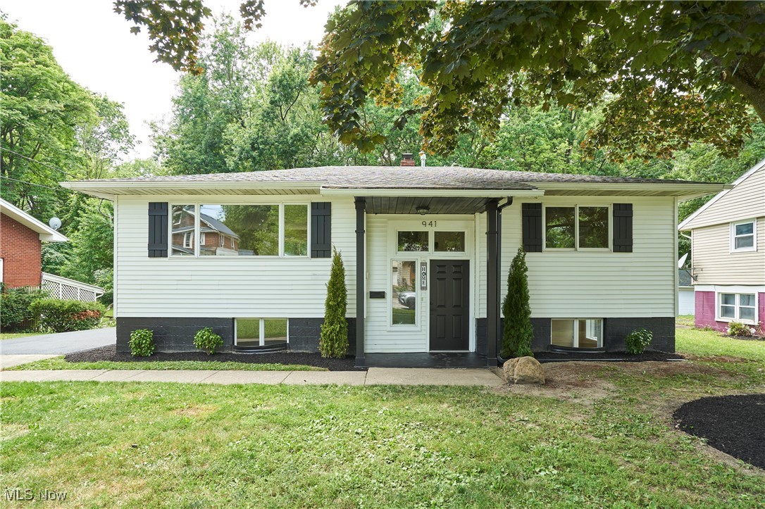 Welcome to this bright and spacious B-level single-family home offering 2,141 sq ft of fully remodeled living space. With five well-sized bedrooms and two full bathrooms, the open floor plan is thoughtfully designed for comfortable family living. The brand-new kitchen showcases beautiful granite countertops, stainless steel appliances, and contemporary cabinetry, delivering both style and everyday functionality. Newly installed flooring, fresh interior paint, and updated lighting enhance the home's modern appeal—making it move-in ready. Outdoor features include a freshly painted rear deck, perfect for open air dining or relaxing with family and friends. The quiet backyard offers plenty of space for recreation, landscaping, or private enjoyment. A detached two-car garage provides secure parking and extra storage. To give you additional peace of mind this home will be covered by a home warranty. Nestled on a quiet street yet conveniently close to the freeway, parks, and the scenic shores of Lake Erie, this home offers the ideal blend of suburban tranquility and easy commuting. This is your chance to make this beautifully, updated property your HOME.