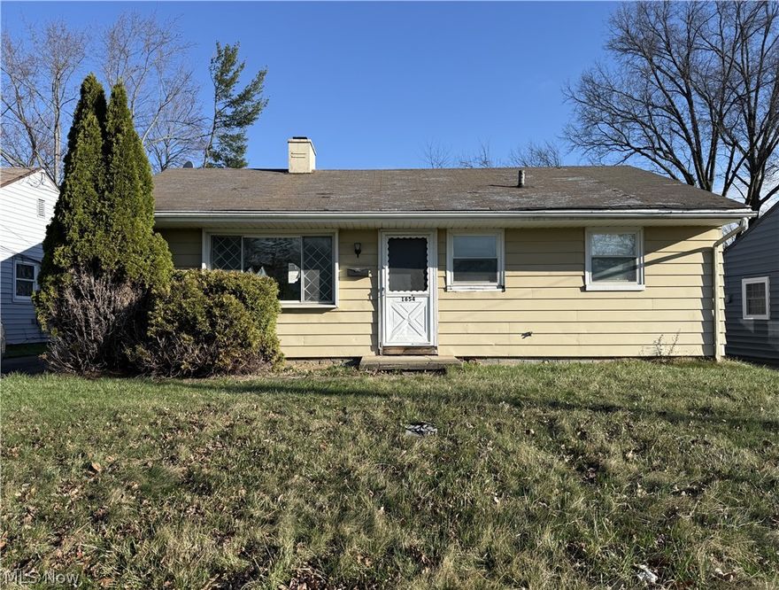 Looking for your next fixer upper or investment property??  3-bedroom slab home with great potential! This one-floor layout offers a spacious living room, three bedrooms, and a full bath. The back patio has been converted into additional living space off the third bedroom. Property includes a detached 1-car garage. Sold AS-IS; Cash or Renovation Loan only.  Most contents will remain. Perfect for rehab, rental, or flip — bring your vision and tools. Call to see it today!