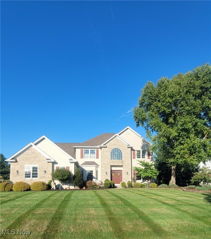 Welcome to this stunning 4-bedroom, 3.5-bath Colonial nestled in Medina’s Fox Meadow development. Perfectly positioned on a beautifully landscaped 0.60-acre lot, this home offers an ideal blend of elegance, comfort, & functionality. The attractive exterior is highlighted by lush greenery, Hardie Plank siding on the front for lifelong low maintenance, & a spacious 3 car side-load garage w/ a sleek 2023 polyaspartic floor coating. Step inside to a 2 story foyer that sets the tone for the rest of the home. The formal living room flows into the formal dining room; an ideal setup for entertaining. A private main-floor office w/ a bay window offers a quiet retreat for work or study. The vaulted family room features a cozy fireplace & opens to the eat-in kitchen, which boasts a bright vaulted dining area, white cabinetry, ample countertop space, tile backsplash, two pantries, & included appliances. Convenience continues w/ a main-floor powder room & laundry room. Upstairs, you'll find 4 generously sized bedrooms and 2 full baths. The luxurious master suite impresses with its vaulted ceiling, sitting area, huge walk-in closet, & en-suite bath complete w/ double vanities, jetted tub, skylight, & walk-in shower. The expansive finished basement offers multiple recreation rooms & a full bath; perfect for guests or family movie nights. An added bonus is the secondary access to the basement from the garage. Step outside to enjoy a backyard designed for relaxation and entertainment. A spacious deck leads to a sprawling concrete patio, an enclosed gazebo, a hot tub & sizable yard w/ an invisible fence for furry family members. With numerous updates including a 2017 roof with a 40+ year transferable warranty, a 2015 Carrier Infinity Smart HVAC system, a 2023 hot water tank, and this move-in-ready home also offers peace of mind w/ a 1 year home warranty! Don’t miss your opportunity to live in one of Medina’s premier golf course communities—Fox Meadow!