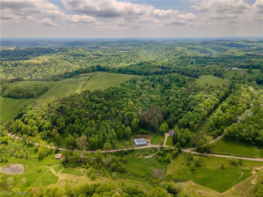 Photo of 2250 Indian Camp Run Road, New Concord, OH 43762 (MLS # 5211986)