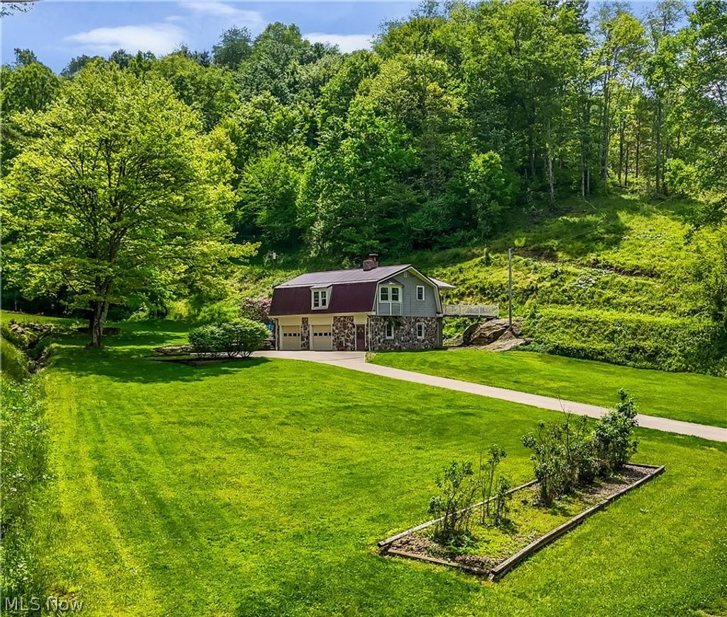 Photo of 2250 Indian Camp Run Road, New Concord, OH 43762 (MLS # 5211986)