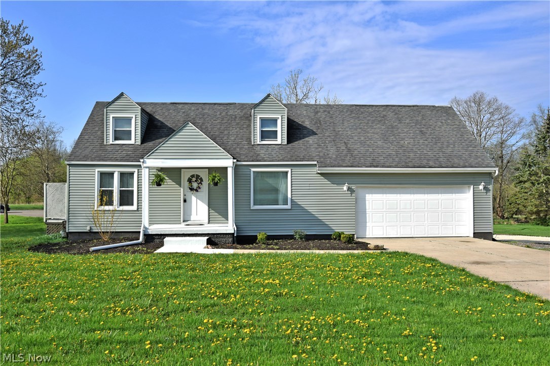 Move quickly to visit this charming two-story home, staged and ready for you! Filled with recent updates, heating and cooling (2017), electrical and plumbing (2007) this residence draws you in with plenty of style from its clean gray siding (windows and siding replaced in 2007), lush yard and well- manicured landscaping. A large, fenced in rear patio seals the deal along with a newer concrete driveway and sidewalk. Inside, the first floor opens to reveal spacious rooms filled with rich hardwood styled flooring. The contemporary kitchen boats bright white cabinets, marbled counter tops and fresh stainless appliances (2017). A dining area shares the floor plan as a first-floor bed and full bath are located at the end of the hall, along with patio and basement entrances. Upstairs, three spacious bedrooms chain together with unique nooks and ceiling design, perfect for the kids. An additional full bath features a gorgeous wood vanity and mirror to combine with pocket storage areas and an