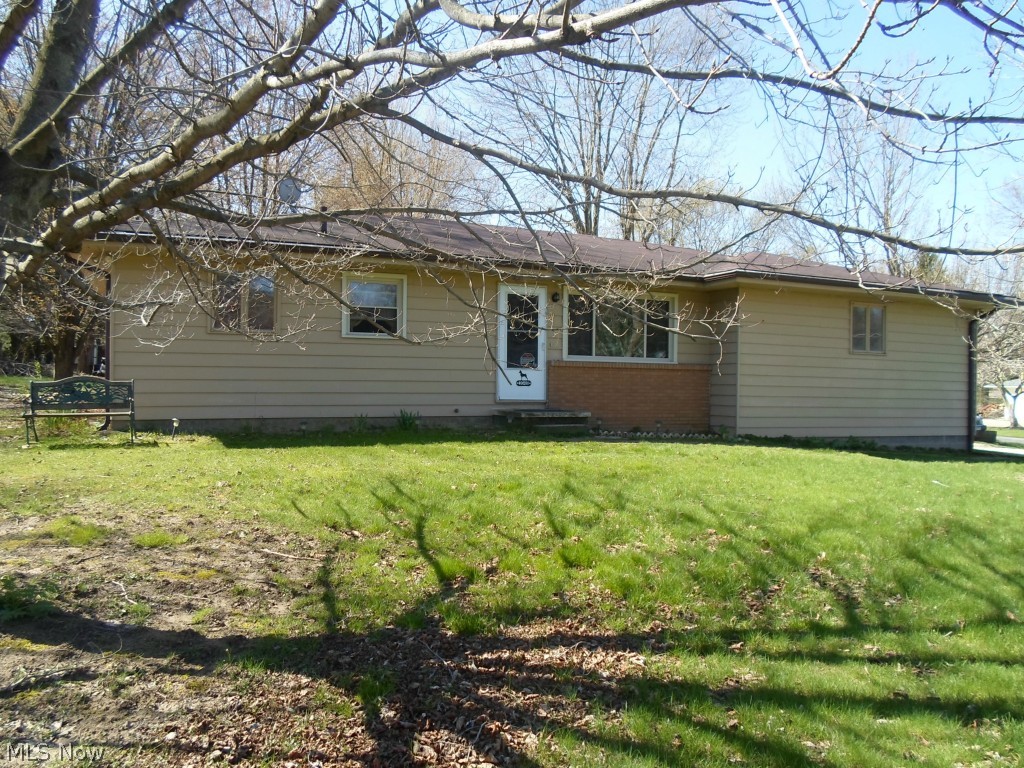 This solidly built home sits on over an acre, corner lot and features plastered walls, hardwood floors and a fully finished basement with a kitchenette and bathroom. Updates include furnace (3 years) windows (3 years) roof (7 years) and hot water h eater (5 years). There is a privacy fence around the 18x20 deck and a large dog run.