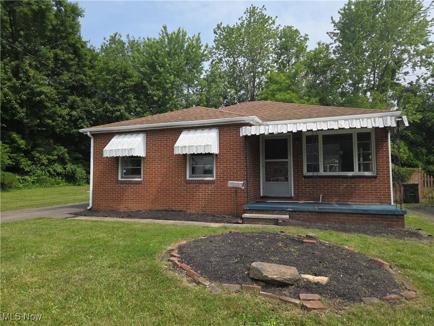 All brick two-bedroom, one bath ranch home on a double lot with a 1-car, detached garage.  This is a Fannie Mae Homepath property.