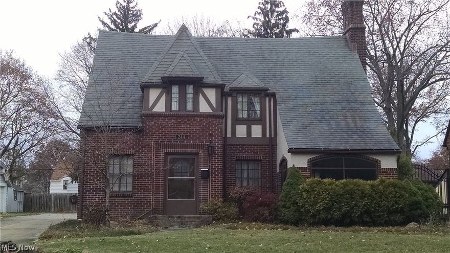 This three bedroom tudor is ready for a new owner, and features a two-car garage, partially fenced backyard, fireplace, neutral decor, new appliances, hardwood floors, formal dining room, breakfast nook, and partially finished lower level.