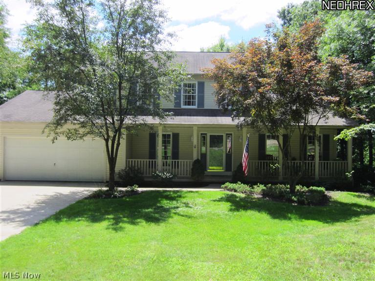 Visit this 1866 SqFt.center hall colonial home on 4.3 private acres with spectacular views from the large deck off the great room. This home features 3 bedrooms on the 2nd floor,the 16'x14' master suite has a full bath and walk in closet. 4th bedroom or office on 1st floor. Fully applianced kitchen plus washer and dryer. The full walkout basement is partially finished for an additional 620 SqFt.. A professionally landscaped lot surrounds the home. Last but not least imagine the possibilities for the 30'x40' outbuilding with 220 service. America's Preferred Home Warranty included.