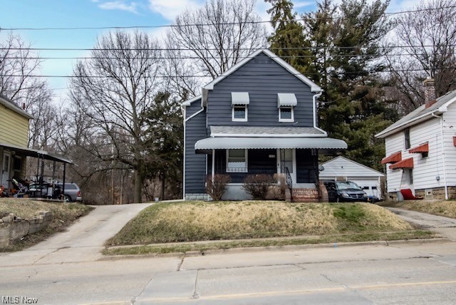 INVESTORS SPECIAL DONT PASS THIS UP!!!! Nothing for you to do. This home has been totally renovated and a one year lease secured for $1100 per month plus utilities. This is a beautiful 2 BR colonial across from East middle and high school. Close to the highway and shopping. Upgrades include painting interior and exterior, 5 vinyl windows, new plumbing, gfi added to the kitchen along with new counter, stove and refrigerator, all new lighting with fans in DR,LR and bedrooms, LVT flooring on main floor & bath, carpeted bedrooms, new rear door & storm, side storm door and front storm door, rebuilt porches , gravel driveway and you will love the 2 car garage that sits on an additional lot in the rear with a fenced in yard great for barbecues or children's play area. Garage has electric and new unconnected gas line ran. Exterior cameras do not convey. You have 2 access driveways to this property. One to the left of the home and the other by turning right just pass the house on the