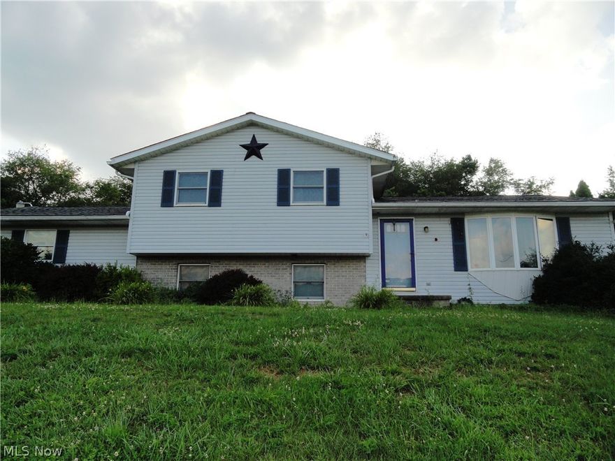 4 BR/3 bath, multi-level home on 4.78 acre lot w/panoramic view of the country side, L shaped LR and DR combo with fully equipped kitchen, large rec room, spacious master suite, large basement that can be finished for additional square footage, 2 car attached garage with a bonus detached garage, relaxing back deck with a fenced in in-ground pool and hot tub, STOP-please do not go to the property without an appointment, if you want to see the property turn at the bottom of the driveway, do not access the driveway w/o an agent present.