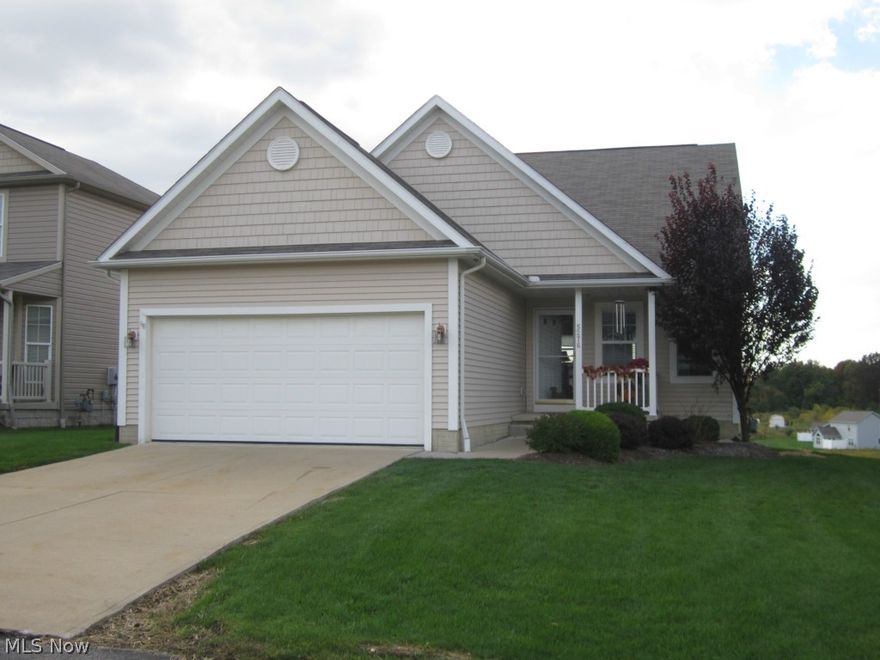 Professionally painted interior.  Spacious freestanding cape cod condo with first floor master suite.  Vaulted living room, open floor plan.  Applianced kitchen/corian counter top, breakfast bar and pantry.  Dining room opens to sunroom, slider to 12X12 deck.  Real hardwood in kitchen, dining and sunroom.  Home wired for surround sound system and security system.  Full walk-out basement with slider to 12X12 concrete patio.