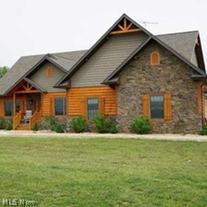 The property offered in 3 parcels and in its entirety. Supplements included in listing information. A complete description ,maps,pictures,and virtual tours of this dream property. Home has 22ft. open ceilings, 70x100 outbuilding. WILL BE AUCTIONED TO THE HIGHEST BIDDER JUNE 23,2015