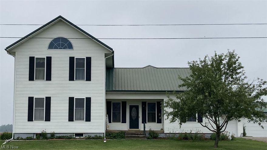 Have your home make you money, with a CAUV, plus do some farming or rent the land, or just do horses! Don't miss this 4 bedroom, 2.5 bath Colonial home the possibilities are endless.  The home was taken down to the studs 2008 includes new Vinyl siding, Metal roof, Cental Air, Windows in 2017, doors 2012, new water heater this year 2023.  The Great room was added in 2008 this room combines the Livingroom, Dining room, Kitchen together great if you like more space.  The room by the front door could be a formal dining room plus upstairs there are 2 bedrooms, plus an additional room which could be an office.  This home comes with 10 acres, with CAUV.  The gas well located on the property the owner receives a check per year, plus free gas up to 3,000 cubic. The detached garage is 20' x 22'.  The pole barn built 2013, 40'x60', 14ft, concrete floor 8 inch of concrete. Perfect for a workshop. The old barn to the right of the house and the old grain bin are not part of this property.