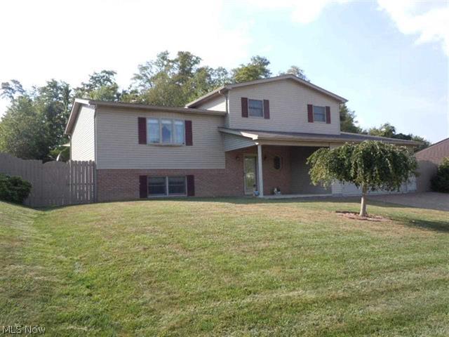 Country Club Estates. Lovely large 3 bath home. 1st floor family rm w/2sets french doors to patio.Has adjoining bonus rm/office. Elect FP's. Formal DR w/french doors to deck overlooking fenced bk yard w/newer french drains/retaining walls. New ceramic-tiled RecRm with storage rm, closets, laundry rm in lower level. Immed. occupancy. MOTIVATED SELLER.