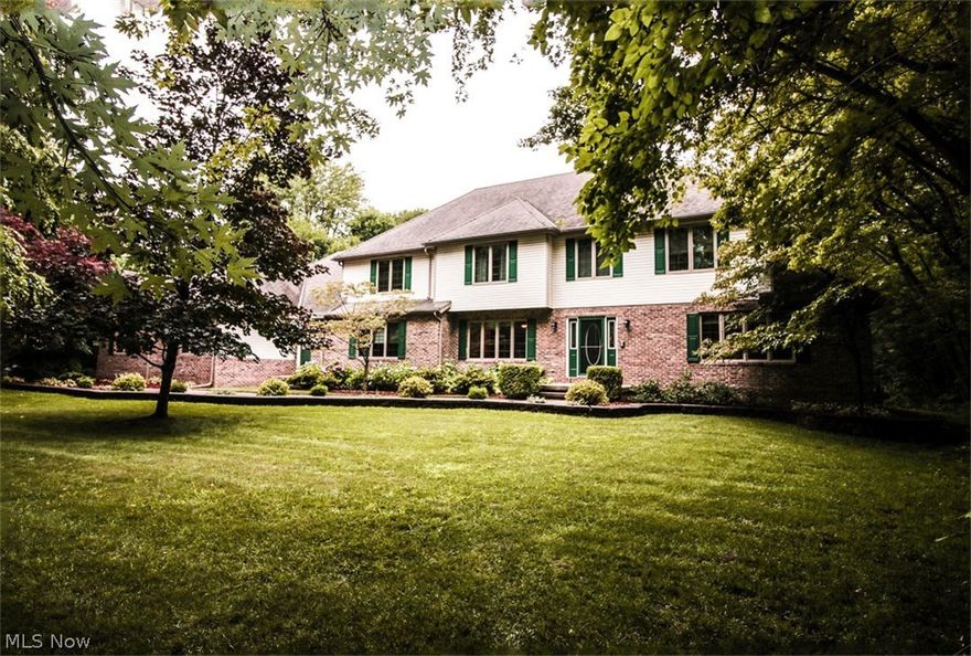 Three L's in Real Estate...Location, Luxurious, and Love those back-yard parties! What an opportunity to own a 6 bedroom-5 bath brick and vinyl colonial loaded with upgrades and amenities/ Built on a very private country wooded setting and still located seconds from restaurants and shopping/ Two story entry foyer/ Open floor plan connects Dining Rm-Kitchen-Living Rm-Billiard Rm/ Large eat-in Kitchen (appliances stay) has  plenty of cabinets, large island, and new granite tops/ Dining Rm currently used as a den/ 2nd Master Bdrm or In-law,teen-suite on 1st floor with large bath (handicap entrance and shower) / 14 x 12 Laundry Rm on 1st floor with 7 x 6 pantry/ Second floor has 5 additional Bdrms and 3 additional full baths/ Not a small sized room in the bunch/ Generous Master Bdrm with sitting area, large walk-in closet and bath with whirlpool tub, shower and 2 sinks/ All baths have granite counters/ Basement ready for your personal finishing touches-2 furnaces-2 water heaters- 2 A/C units/ 4+ car garage with stairs to basement/ Slider in Eat-in Kitchen leads to fabulous raised deck-grilling-entertaining area giving the 30 ft pool that "in-ground" look/ Maintenance free brick and vinyl exterior/ Extra wide concrete driveway/ Swing set stays/ Nicely landscaped yard with mature trees buffering this oasis/ 1.37 acres!!! You can't build new and get all this anywhere near this price/  Very reasonable taxes too/  This is a "must see"!