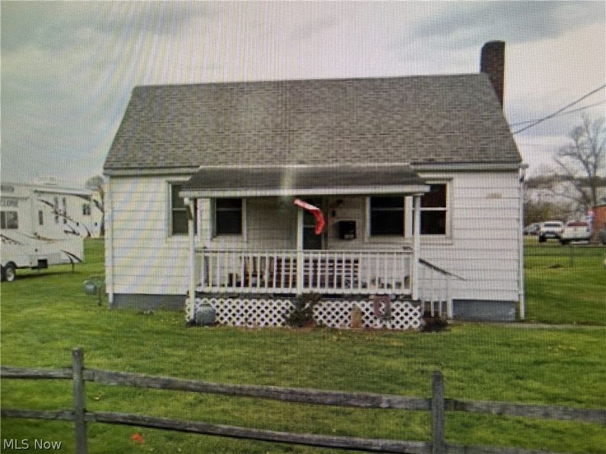 Ranch with covered Front and back porches, large corner lot, with off street parking and public utilities. Two or three bedroom with one bath, basement, small shed for storage.