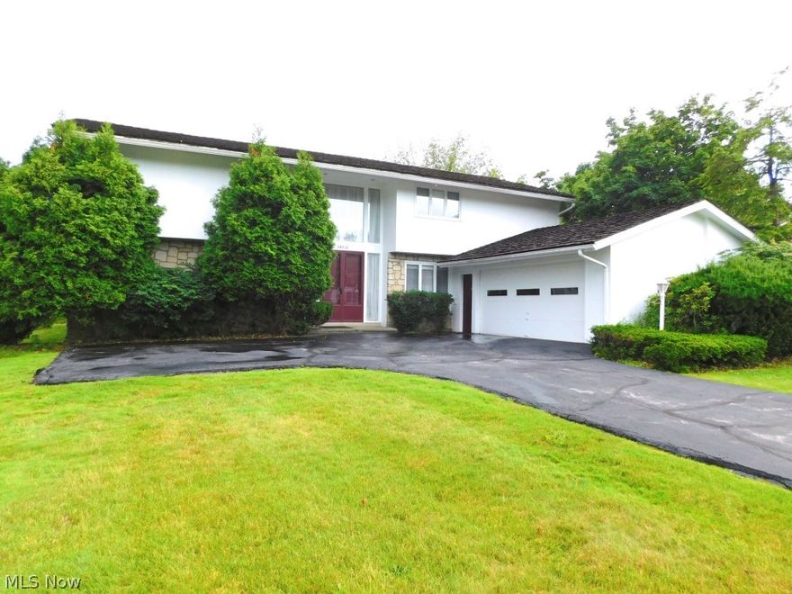 Superb Beachwood Location. Spacious 3200 sq. ft. center entrance Colonial with an open two story foyer.. This is a 5 bedroom, 4 1/2 bath home. Enjoy entertaining in your fabulous gourmet kitchen with stainless steel appliances, granite counters, and glazed cabinets and large eating area.  All of the rooms are generously sized ,  and neutral decor. The family room has fireplace and bar, there is also formal dining room and a first floor laundry. Finished lower level has a large recreation room, extra room  (fifth bedroom)and newly installed full bath. Master bedroom has walk in closet, dressing room and full bath.