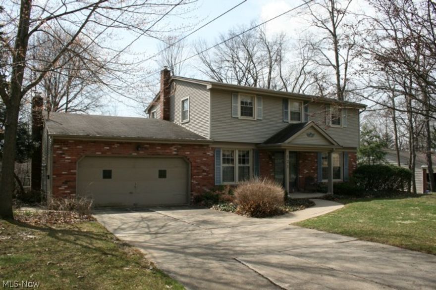 Four bedroom 2½ bath colonial in a very desirable, mature, Canfield neighborhood. Many updates.