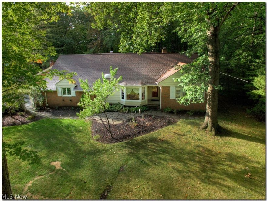 This sun drenched Town & Country Cape has it all. 1st flr living at it's finest. Master on 1st w/ensuite + Office/den, Family rm & Laundry. 4/3.5 +1269 sqft heated gym, in sought after Meadowood Ln. Enter into the stunning open flr plan. Enjoy cooking in your open flr plan dream eat in kitchen w/newer Cambridge toned cabinetry, granite countertops, lrg island, S.S appls, lrg wall of windows and hdwd flrs thru-out 1st flr. The open bright & airy living rm is prefect for entertaining family and friends or cozying up in front of your wdburning frplc on those cold winter nights. Enjoy the wall of windows overlooking your private retreat w/green lush property as far as the eye could see. Den features 2nd wd burning firplc, wd paneling, beamed ceiling, wd paneled ceiling & sliders leading to yr deck were you can relax and enjoy your private oasis. This home features an indoor pool that has been flred, now a heated gym/rec (pool can be restored) 2nd flr has 2nd possible master w/bath & 2 othe