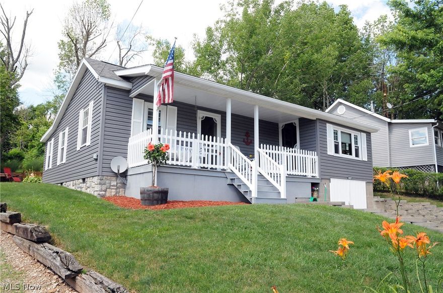 Look out over Seneca Lake as you swing on the front porch or relax in the hot tub on this beautiful back patio. Featuring 3 bedrooms, one bath, gas fireplace, heat pump, and a basement garage, newer vinyl siding and windows, and all appliances and hot tub included. Purchaser may join the private boat club with concrete launch and boat dock available. Friendly community atmosphere.