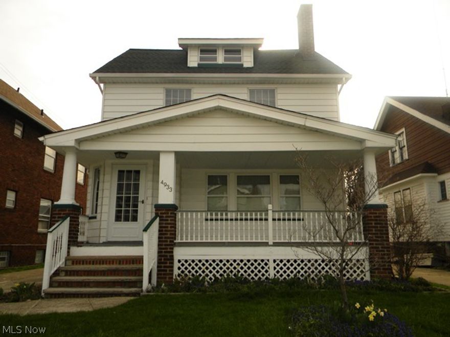 Nice Front Porch Colonial in move in condition.  3 bedrooms and 1.5 baths.  Hardwood floors in living, dining, and all the bedrooms.  Beautiful stained glass foyer leads to the large living room with hardwood floors and decorative fireplace. Dining room has hardwood floors and pretty built in cabinets.  Kitchen has updated cabinets, stainless steel sink and all appliances included.  All the bedrooms upstairs have hardwood floors (under carpet in two the bedrooms that have carpeting).  Walk up attic space is perfect for storage or could be finished for extra living space.  Full basement with half bath and separate workshop room.  Additional updates include new roof 2012, main bath updated 2013, kitchen cabinets 2002, interior paint 2006, and 100 amp service panel 1996.  Make your appointment to see this home today, you won't be disappointed!