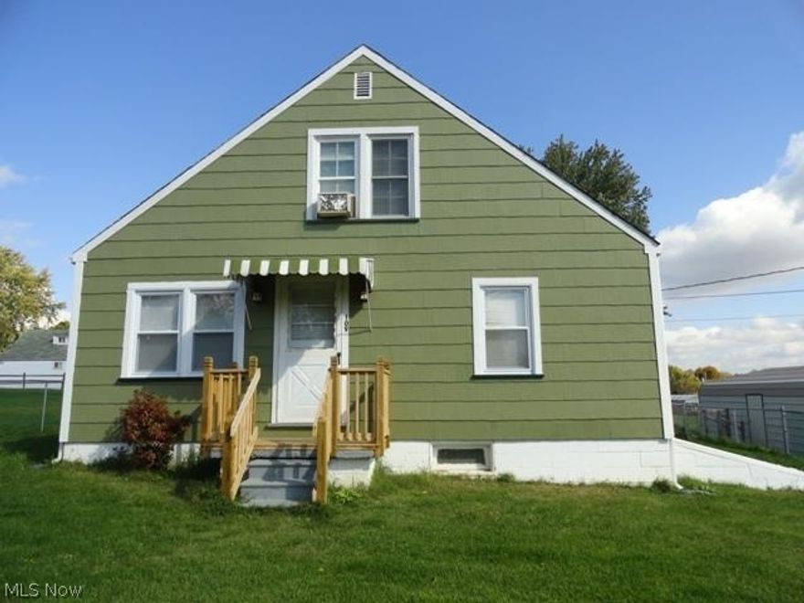 4 BR, 1.5 BA home on level fenced lot.  Spacious eat in kitchen, 2 main fl BR, full bath on main, new 1/2 bath on 2nd.  2 New BR on 2nd floor.  New flooring thru-out home.  Fresh exterior paint & updates. New railing on front porch, new carpet on back porch.  Detached garage.  Great family home or investment property.