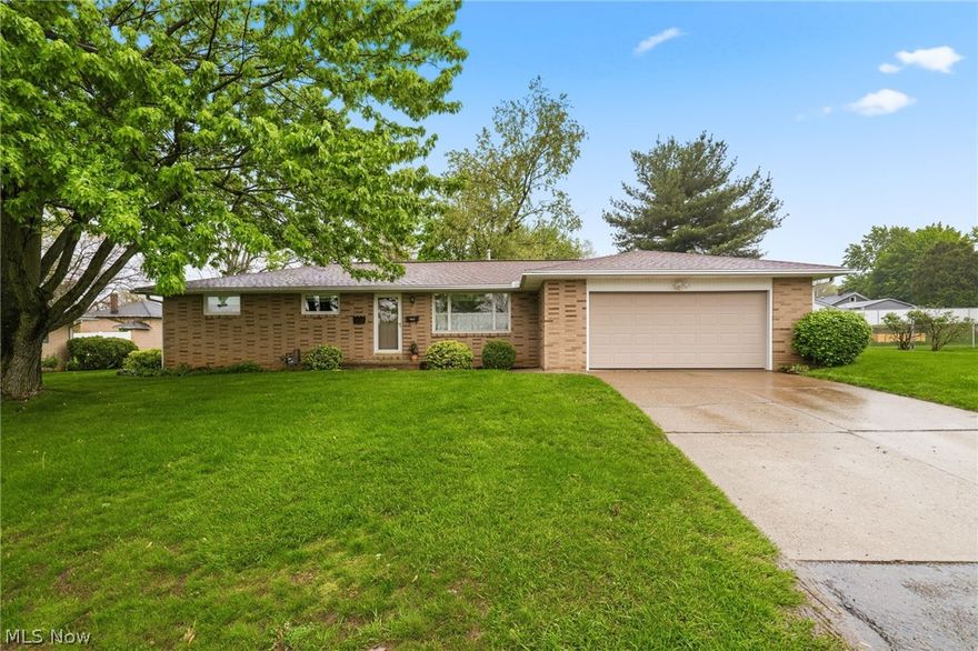 Welcome to 462 Ford St NW Massillon, Ohio.  This home boasts a classic, low maintenance all brick exterior, radiating a sense of permanence and warmth.  The ranch style silhouette offers effortless single level living, anchored by a two car attached garage positioned at kitchen level for easy grocery hauls.  The property has been meticulously maintained rather than just lived in.  The heart of the home is a large family room, designed for gatherings and relaxation.  The clean and move in ready condition means you can skip the renovation dust and start living from day one.  The kitchen conveniently located adjacent to the garage, means the layout prioritizes flow and accessibility.  Practical peace of mind comes included, specifically with the brand new hot water tank, tackling one of the major hidden costs of homeownership early.  The huge walk out basement is a stand out feature, offering massive versatility.  This flex space could be used for a home gym, theater or playroom.  The fact that it is partially waterproofed shows a proactive approach to home care.  Having a bathroom downstairs significantly increases the value and usability of the lower level, making it a viable guest suite or ultimate man cave.  The lot is intelligently utilized to provide two distinct outdoor experiences.  Schedule your showing today!
