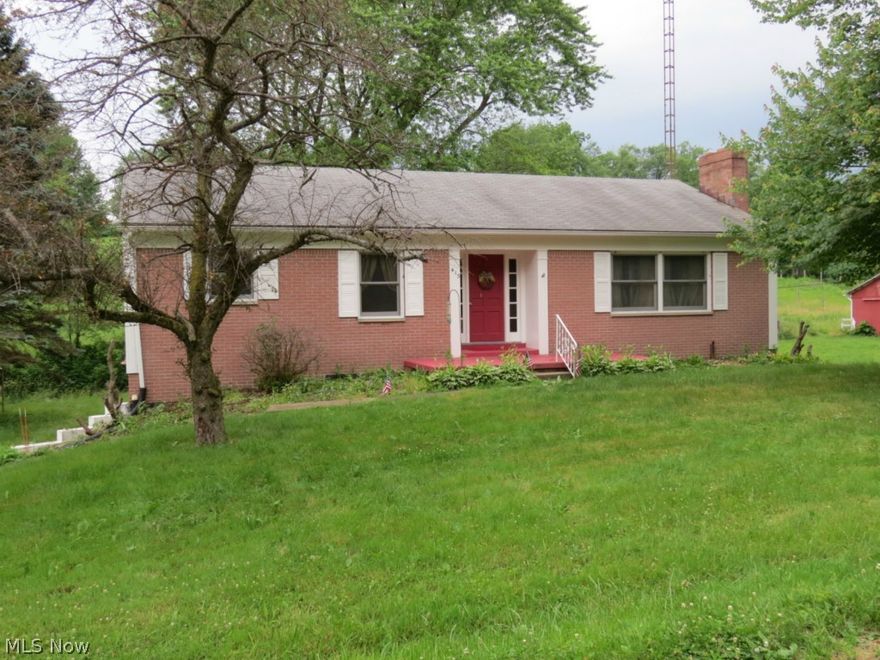 Super 6.1 Acre Mini Farm at Paris! Nicely updated 3 bedroom, 2 bath ranch with full lower walk out level and 2 car drive under garage. Home is clean and has replacement windows, new paint and floor coverings, updated furnace and AC , new laundry hookup installed on the main level, etc. Also, a large pole barn that's well suited for horses, cattle, or just storage. Plenty of room to play on this good laying property! Very affordable, great location, and in Minerva School District! Call to view!