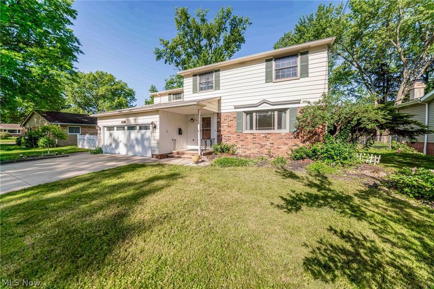 Welcome to one of Berea's most unique opportunities, offering the rare convenience of two owner's suites, each featuring a private full bath and walk-in shower. Ideally located near Baldwin Wallace University, shopping, parks, major highways, and Cleveland Hopkins Airport, this spacious home combines flexibility, comfort and convenience. The main floor features a formal living room, dining room, custom kitchen, laundry room, and a first-floor owner's suite. Just off the dining room, the inviting four-season room with a gas fireplace creates the perfect space to relax year-round. Upstairs you'll find three generously sized bedrooms along with a second owner's suite complete with a walk-in closet and private bath. The finished basement provides additional living and entertaining space, while the unfinished area offers abundant storage and workshop potential. Outside, enjoy the charming white picket fenced backyard, patio, and dedicated garden space. Recent improvements include fresh paint, hardwood flooring throughout many areas, replacement windows, and updated mechanicals including the furnace, air conditioning and hot water tank. Move right in and enjoy everything this versatile Berea home has to offer. Agent owned.