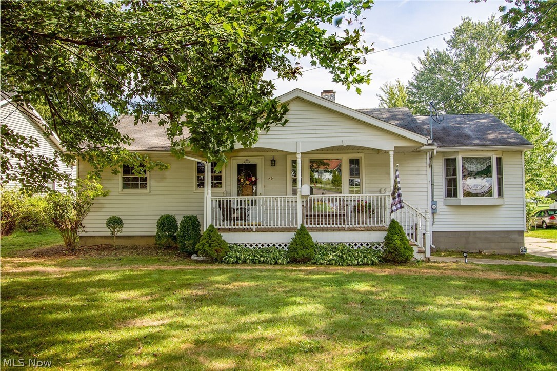 Welcome to this beautiful ranch resting on 3 acre of serenity, and just walking distance from the nostalgic downtown Seville! Warm and welcoming front covered porch to sit out and watch the people go by. This home offers a stunning updated large eat in kitchen; all newer windows throughout and a newer storm and screen door off of kitchen that leads out onto a large deck! The family room and all 3 bedrooms have hardwood floors! The home also includes 1.5 baths, and the lower level is finished which includes a room that can be used as a guest bedroom or office and half bath as well! 2 car garage (detached) and the over-sized 3 car garage/outbuilding that provides ample storage! The home was recently professionally power washed. This home is a Must See! Must Have!
