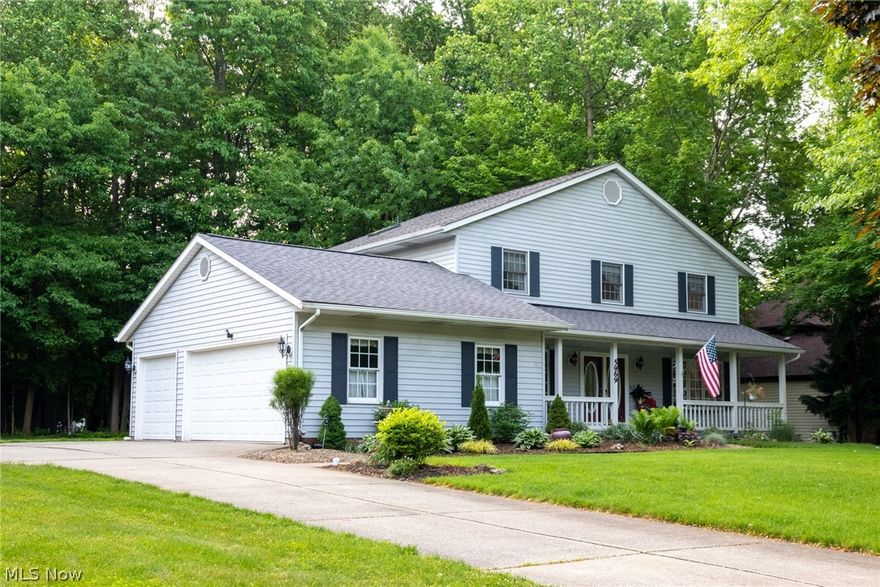 Welcome to this beautiful Mentor colonial in highly sought after White Oak Village.  This 4 bedroom, 2.5 bath home with 3 car attached garage is situated on a park like 1/2 acre.  Formal dining room, formal living room, first floor laundry and slider to over-sized deck are just a few of the amenities the main floor has to offer.  The wood burning fireplace adds warmth to the large and inviting family room.  Entertain on the back deck, enjoying the shade of mature trees and the tranquil sounds of a decorative water feature.  The second floor showcases four generously sized bedrooms, including a master with an extra large walk-in closet.  The lower level features a massive recreation room carpeted May 2020 and a wet bar with built-ins for all your entertaining needs.  Stay in shape with a bonus fitness room, or convert to a hobby or play room... possibilities are endless.  Updated furnace and A/C.  Aggressively priced, this home will not last, schedule your private home tour today.