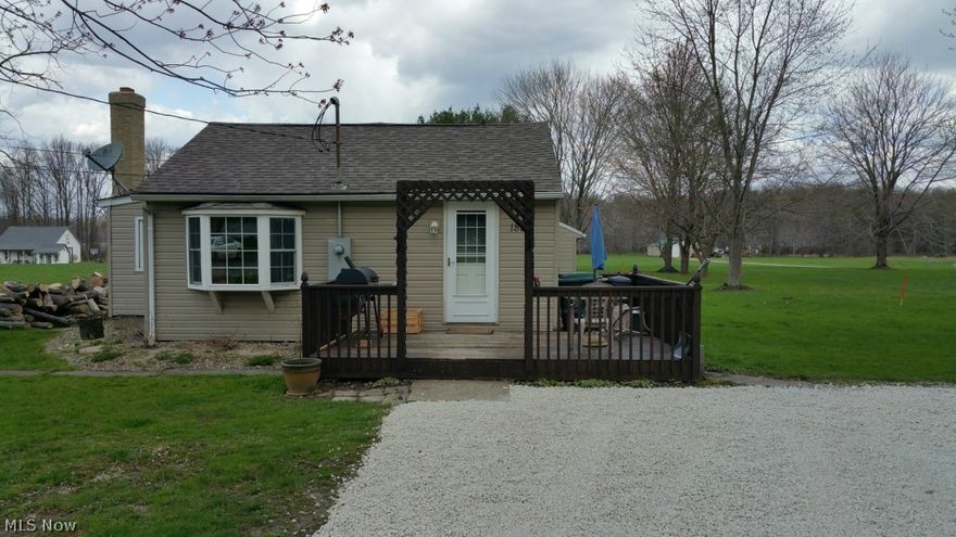 Cute little Ranch home in Brimfield located on a large 3.56 acre lot that sits on two parcels. Woods are in the back half of the lot. Located on Old Forge Road just off of route 43. Siding, windows, roof and Kitchen are newer. Owner uses the fireplace as their primary source of heat. There is electrical heat pumps if you prefer a more traditional method. Close to Kent, Tallmage, Stow, Hartville, Rootstown and Mogadore. Schools, shopping and food are close by too. Dont miss out on a cute little starter home on a huge lot in Brimfield. Call for your private showing today