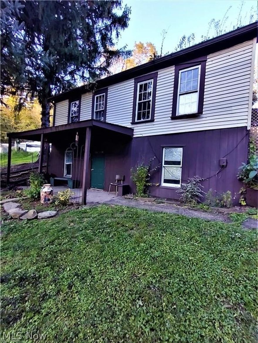 Two bedroom home tucked away on a dead end road sitting on over 5 and a quarter acres, you can almost throw a rock and land in the Ohio River. Per owner, metal roof 5.5 yrs old, furnace 4.5 yrs old, updated electrical put in 5.5 yrs ago and a hot water tank installed 5-6 yrs ago. Centrally located in the Ohio Valley minutes away from shopping, dining, healthcare, grocery and entertainment. Property is mostly wooded with plenty of wildlife and privacy.