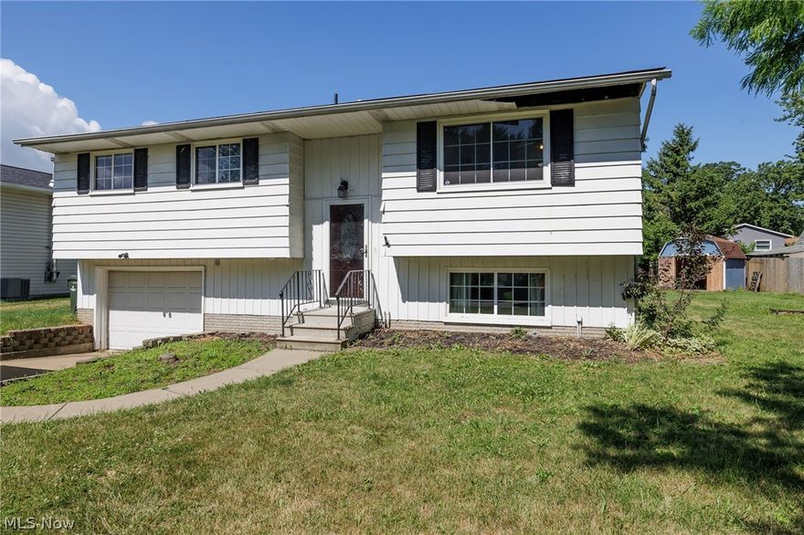 Nicely located bi-level home ready for your updates. A little TLC and elbow grease and you'll have instant equity. Home offers 3 bedrooms, 1 1/2 baths, an attached garage, and a large yard. The lower level has plenty of additional living space. This home is being sold "AS - IS".
