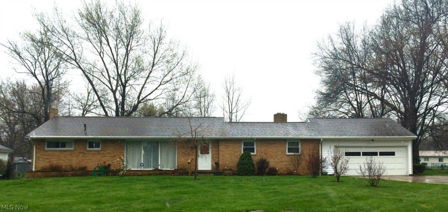 Move-in Ready 3 Bedroom 2 Full Bath Ranch in Manchester. Updated Kitchen cabinets with a Jenn-Air cooktop/grill and wall oven and ceramic tile floor. Large living room with built in shelves and large windows. Large family room features a fireplace and slider to the enclosed patio. Enclosed patio has nature stone floor with built in grill area leading to the backyard. First floor laundry hookup and also laundry area in basement. Two car garage with opener and also nature stone floor. Large unfinished basement. New roof and vinyl siding in 2013.