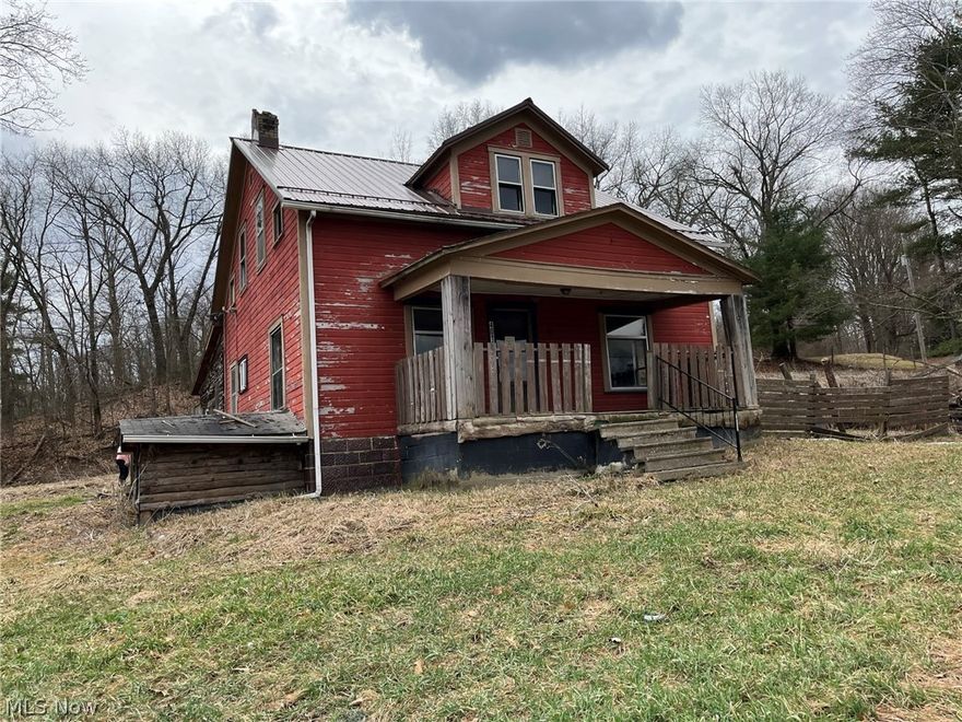 Home is located on a hone acre lot on a hill with a wooded view. New metal roof installed in March 2022. Major renovations are needed. Home contains mold. County health department reports septic system was installed in 2007 No info available for the well.