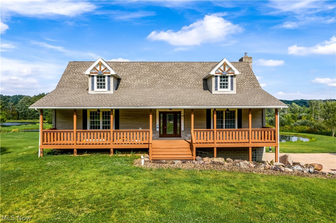 Welcome to 7255 River Styx. Live in the country but near so many amenities! This incredible, 2,800 square foot home sits on over 7 acres. The expansive property features a paved driveway with fully stocked fishing pond, and beautiful rocky landscaping. There is also a large, two-story building / shop on the property (40’ x 70’) – perfect for running a business, hobby projects or car storage (fits nine cars). The lift in the shop (could be available for right price). As you enter the home you will be in awe of its timber frame construction and exposed, powder-coated steel beams. The style is the perfect mix of rustic and modern with an open floor plan that is great for entertaining. The center piece of the family room is a full stone wall with fireplace and hearth. The kitchen is state-of-the-art with high-end, solid hickory cabinetry and stainless-steel appliances. Travertine and heart pine hardwood floors run throughout home. There are some finishing touches still to be done, but this