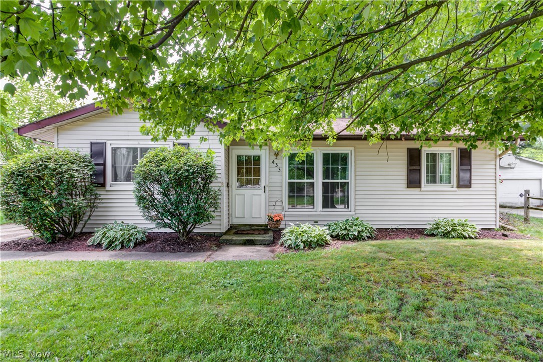 Just walk-in and you’ll fall in love with this 3BR/1BA Ranch home in Berea. The Kitchen is updated with granite countertops, stainless steel appliances, maple cabinets, and ceramic tile flooring. The open floor plan is great for entertaining family and friends. The Living Room and Dining Area are open and light and freshly painted. Newer vinyl wood plank flooring throughout the Living Room and hallways. Updated full Master Bathroom. Three bedrooms with generous closet space. Oversized 2 Car detached Garage with attached workshop/shed. Laundry/ mud room is located off of the kitchen with side door access to the fully fenced back yard. Updated vinyl replacement windows. New H2O Tank (2020). Central Air. All appliances included. One year America’s Preferred Home Warranty included. The location of this property is fantastic, walk to the Metroparks next door and a short drive or bike ride away from downtown Berea and Coe Lake! The seller has loved this home and this quiet neighborhood,