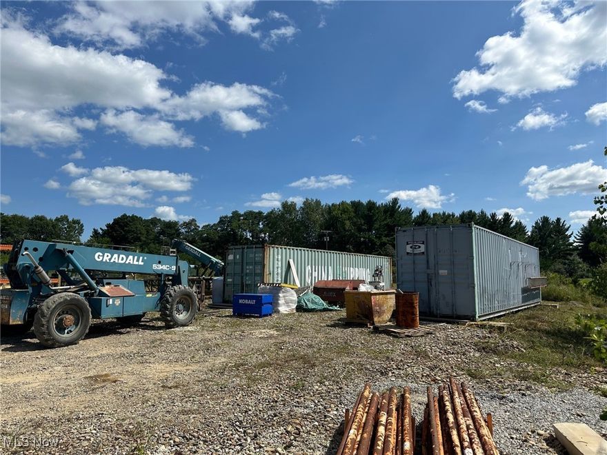 2.0 Acre Light Industrial lot in Ravenna Township For Lease!  Partially Fenced in lot with stone base, and 2 storage trailers on it.  Perfect for a contractor, trucking company, construction company, etc.  Great outdoor storage close to town and near all major roadways.