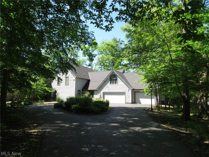 A lifestyle inviting you to enjoy waterfront views & activities while watching wildlife in peaceful setting. Welcoming foyer leads to airy, open floor plan perfect for entertaining. The kitchen, remodeled in 2018, Quartz counter tops, soft close cabinetry w/pull out drawer/shelves, double stainless sink, stainless appliances, built-in microwave, wine fridge, instant fill Keurig, Reverse Osmosis System & spacious pantry. The dining rm w/Cork flooring offers views of the natural landscape & access to the screened porch overlooking the lake. Take the chill off by the fire in the Great Rm while enjoying spectacular lake views. The Master Suite offers options to choose your favorite rm. for a master bdrm. The bonus/lounging rm w/gas fireplace, vaulted ceiling w/display area & sliding door leading to balcony overlooking the lake could be used as 4th bedroom. The adjoining Master Bdrm has two closets & nook for enjoying a good read or maybe morning Yoga. The luxurious En-Suite features a Jett