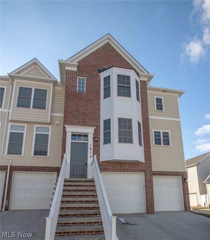 Welcome to the Woodhaven, one of Downtowns most sought after townhome communities. This 2,184 sqft end unit features modern finishes and plenty of space for you to spread out and entertain. The light filled eat-in-kitchen is adorned with light granite counters, dark shaker cabinets and high-end stainless steel appliances. Throughout the living and dining room you will find hardwood floors and plenty of windows to let in the light. Have a barbecue or just enjoy some fresh air from your generous private deck. Head upstairs to the large master suite complete with walk-in closet and spacious private bath. Two additional bedrooms and full guest bath are also found on this level. On the first level is a bonus space perfect for a rec-room, workout room or office as well as the laundry room with matching HE washer and dryer. Located just around the corner from Cleveland Clinic main campus and the RTA Health line. Minutes from University Hospital, CWRU, Playhouse Square, and all that Downtown h