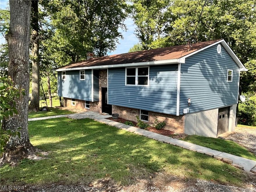 Check out this updated home in the Warren School District. Windows, siding, gutters, doors & soffit are ALL brand new. The HVAC system is less than 10 yrs old. The house boasts an extra large eat in kitchen, family room upstairs and a rec room in the basement. The fourth room in the basement could also be easily turned into an additional bedroom. Enjoy the tree lined backyard while sitting on the deck right off the kitchen.