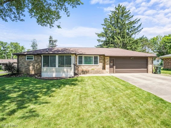 1429 42nd St NW --- An all-brick ranch with over 2,000 square feet of finished living area featuring 4 bedrooms and 2 full bathrooms. The enclosed front porch full of windows is so inviting. Spacious living area with a newer front window. Eat-in bright white kitchen has ample counter & cabinet space with a full wall of pantry-style cabinet storage. Down the hall, you'll find an updated full bathroom w/linen closet right next to the three roomy bedrooms. Open railing stairway leading to the fully finished full-sized walkout basement with a rec room & the 4th bedroom w/closet. The garage also has a stairway leading to the basement --- how convenient is that?! Maybe a future in-law suite? The back yard is fully fenced and has a cement patio, perfect for entertaining. Water Softener is included. Plain LSD. The entire house has newer vinyl and glass-block windows. Storage galore! SO MANY closets throughout & in the lower level. Seller is offering a one-year America's Preferred Home Warranty for additional peace of mind! Don't let this opportunity pass you by --- this gem could be YOURS!