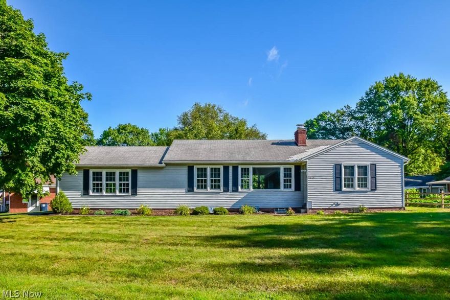 Beautiful 2 bedroom ranch with great curb appeal in Avondale! Inside, there's a functional and versatile layout to meet your needs and new neutral-colored carpet throughout! There's a picture window on the front and back of the house to allow natural light to fill your space. In the living room, cozy up next to the brick fireplace with your favorite read and keep warm all winter long. The dining room opens to the living room - perfect for when you have overflow holiday seating. Prep your meals in the applianced kitchen with a pantry. There's a bonus flex room off of the living room that could be utilized as an office, sunroom or playroom with built-in shelves and patio access. Down the hall, there's a laundry chute, linen closet, 2 bedrooms and a full bath. The master bedroom has 2 closets, built-ins and a makeup area. Extra living space on the lower level includes a finished rec room with glaze tile walls and a fireplace plus great storage in the utility/laundry room. Relax on the pri
