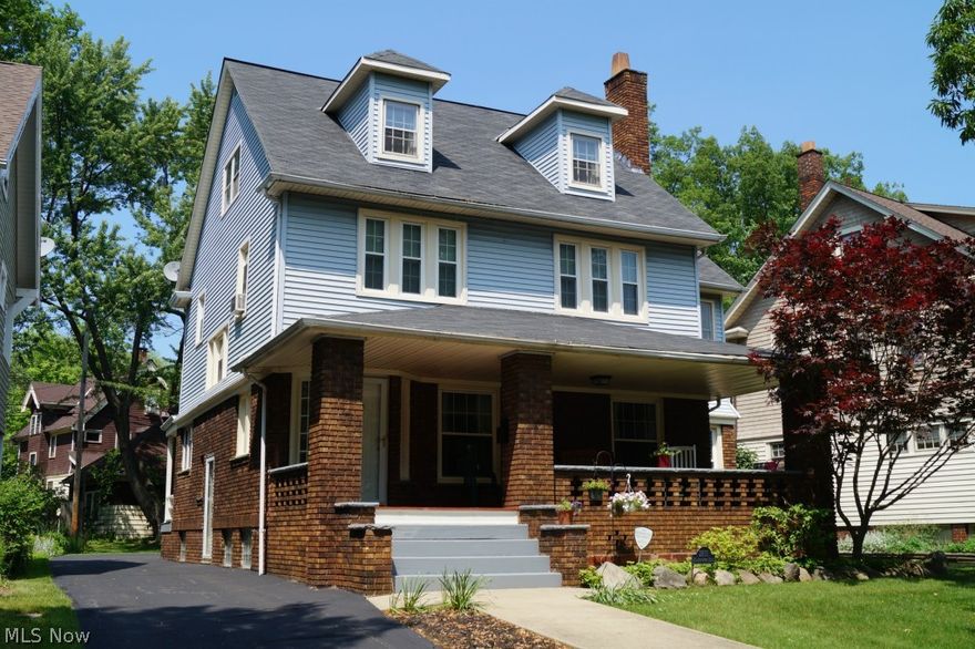Spacious & Well-Tended Brick & Vinyl Sided Front Porch Colonial Ready To Call Home!  Great Details & Floor Plan: Living Room w/Rounded Fireplace Hearth, Formal Dining Room w/Wainscoting & Adjoining Sun/Family Room.  Updated Oak Kitchen. Front & Back Stairs.  3 Bedrooms & Large Sun Room on 2nd. Huge Finished 3rd Floor Would Make a Great Media Room of Guest Suite.  Many Replacement Windows. Boiler Replaced 2007. Driveway 2013. Younger 2-Car Garage Updated Electrical Panel. Glass Block Windows.