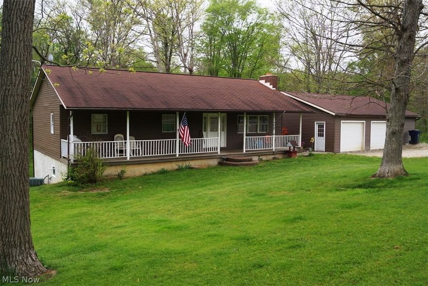 Charming ranch home in the country situated on 2.867 acres. Large master suite with jetted tub. Central vac plus all kitchen appliances. Spacious family room with beautiful stone fireplace in walk-out lower level. 32x36 detached garage with newer roof. Relax on the large front porch on warm summer evenings.