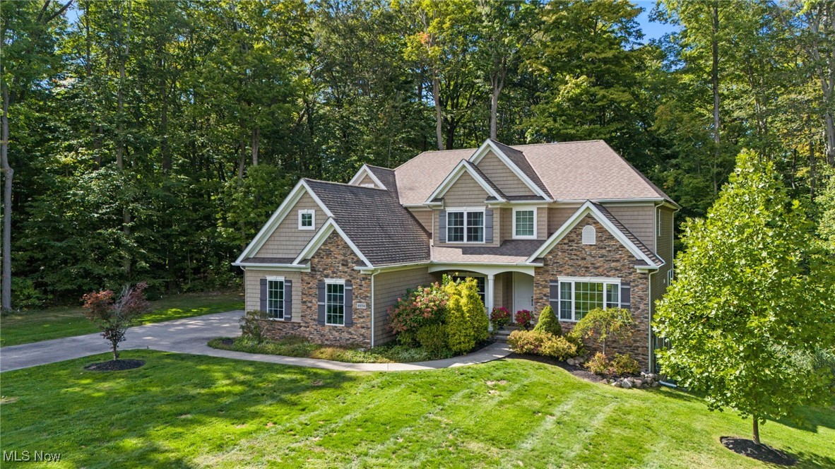 Hidden Gem! Welcome home to 10154 Courtney Lane, located in the heart of Kirtland. Step inside the foyer leading to an inviting open floor plan, featuring a dedicated home office, den, and laundry room, all on the first floor. This kitchen is ideal, with a large granite island, ample bar top seating, and dining room that flows easily. The primary bedroom has a walk in closet and large bathroom suite. Three bedrooms are located on the other end of the loft equipped with a full bathroom. The basement has a 12 course ceiling, perfect for a home gym or workshop! The basement is rough plumbed to accommodate a full bathroom. This property features 3.08 acres of private, wooded land and a three car garage! Design the deck of your dreams off of the dining room sliding glass door that can connect down to the walk out basement! A new transferrable Invisible Fence was installed and comes with three collars! Courtney Lane is nestled off of Billings Road, comprising 7 properties.